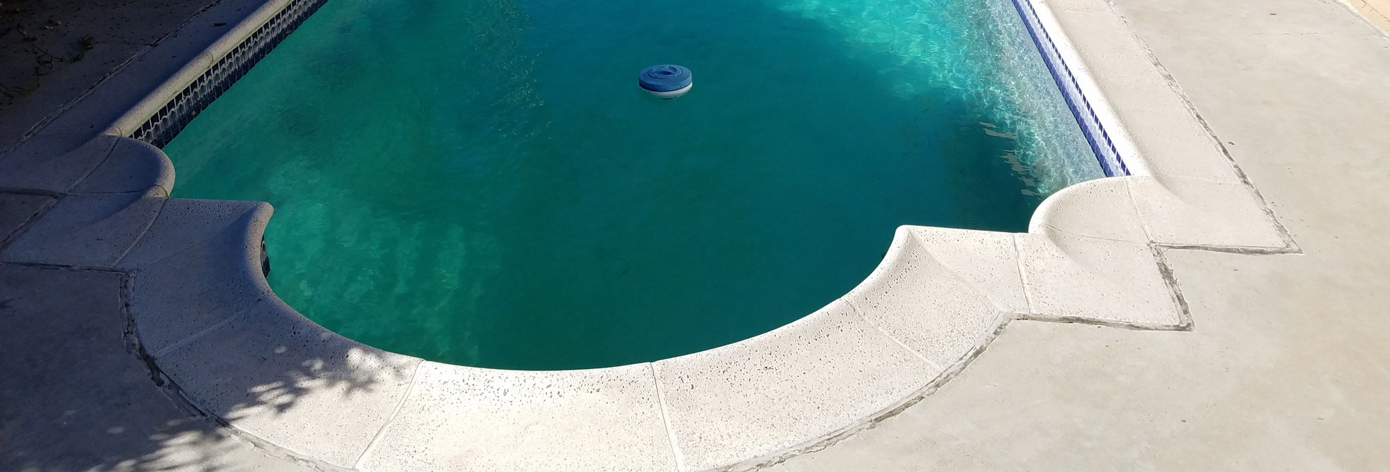 Before and After photos of a remodeled pool