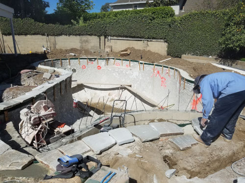 Ramon and his crew continue working on the Flagstone Coping 